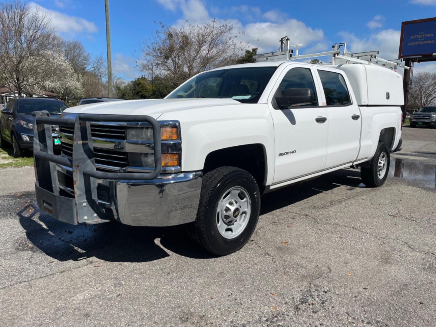 2015 WHITE CHEVROLET SILVERADO 2500H WORK TRUCK (1GC1KUEG7FF) with an 6.0L engine, Automatic transmission, located at 5103 Dorchester Rd., Charleston, SC, 29418-5607, (843) 767-1122, 36.245171, -115.228050 - Local Trade-in with Easy Clean Vinyl Interior, Backup Camera, AM/FM/AUX, Spacious Rear Seat, Power Windows, Power Locks, Power Mirrors, Utility Cab with Storage All Around, Pull Out Bed Storage, Ladder Rack, Safety Strobe Lights, Keyless Entry, Tow Package with Brake Assist, 4-Wheel Drive, Brush Gua - Photo#2